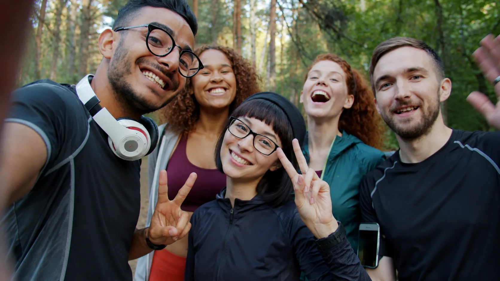 a group of friends together, smiling